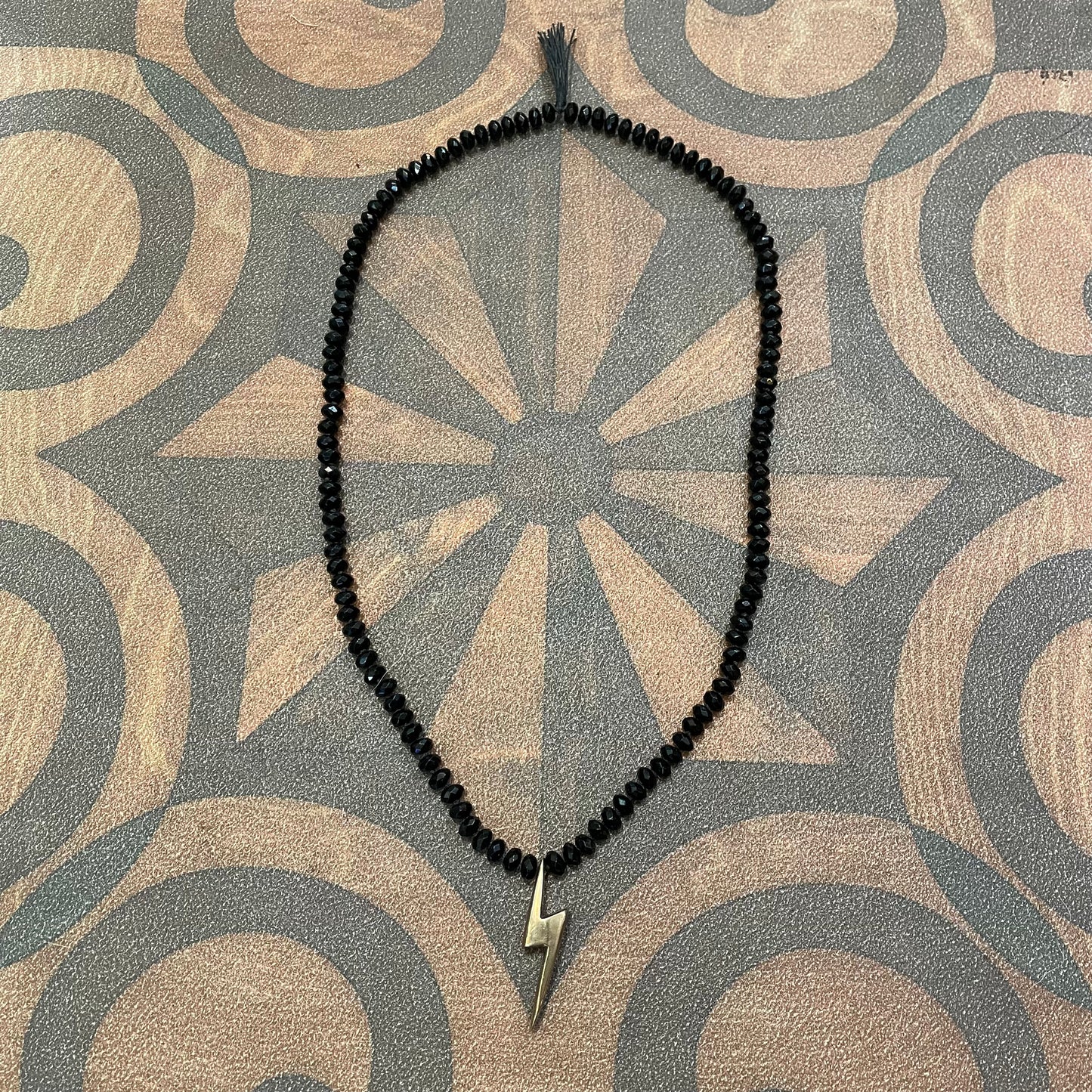 Bronze Lightening Bolt on Jet Beads