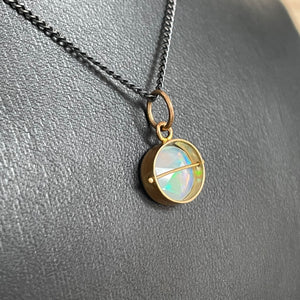 Captured Ethiopian Opal Pendant