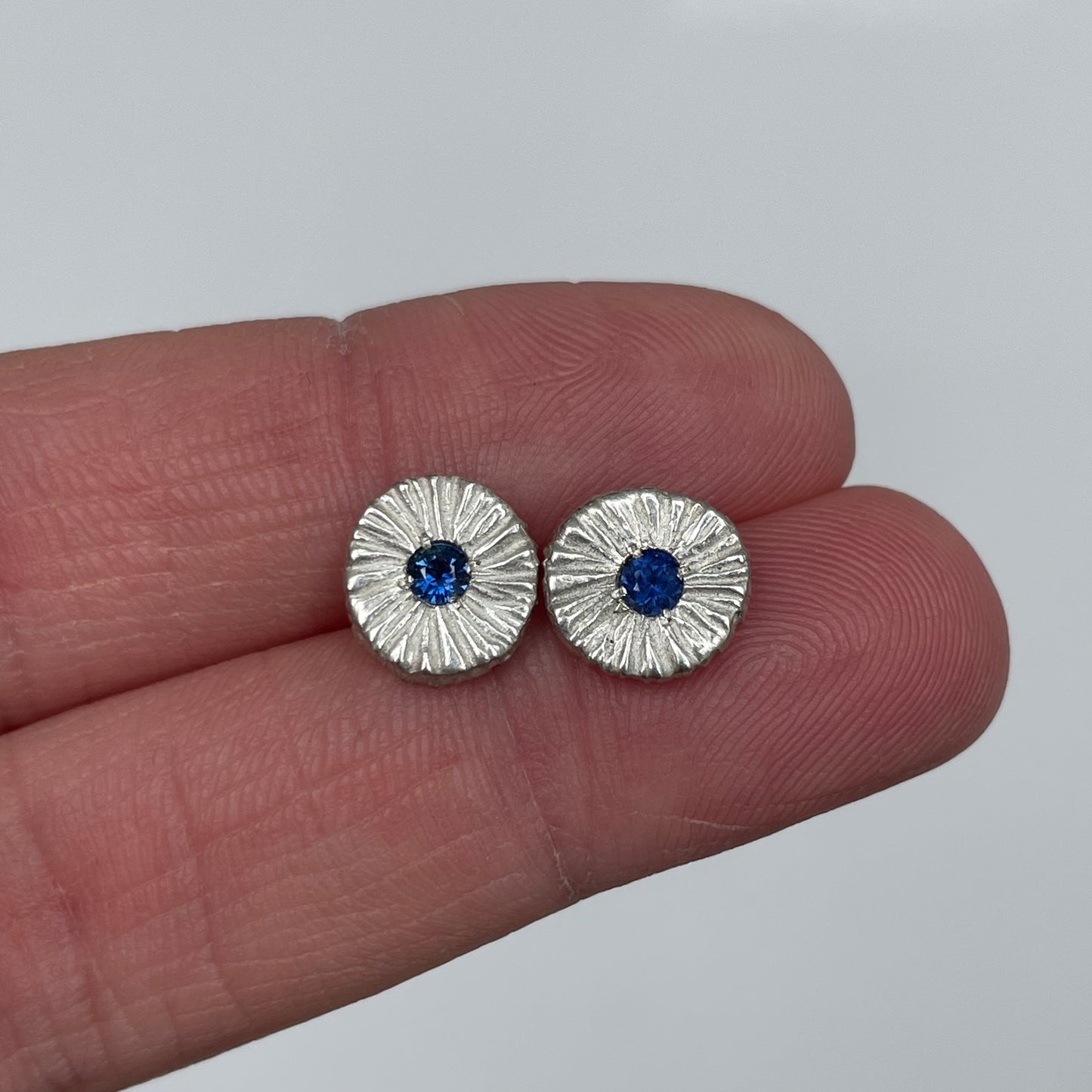 Small Bright Silver Circle Dig Studs With Sapphire Stone