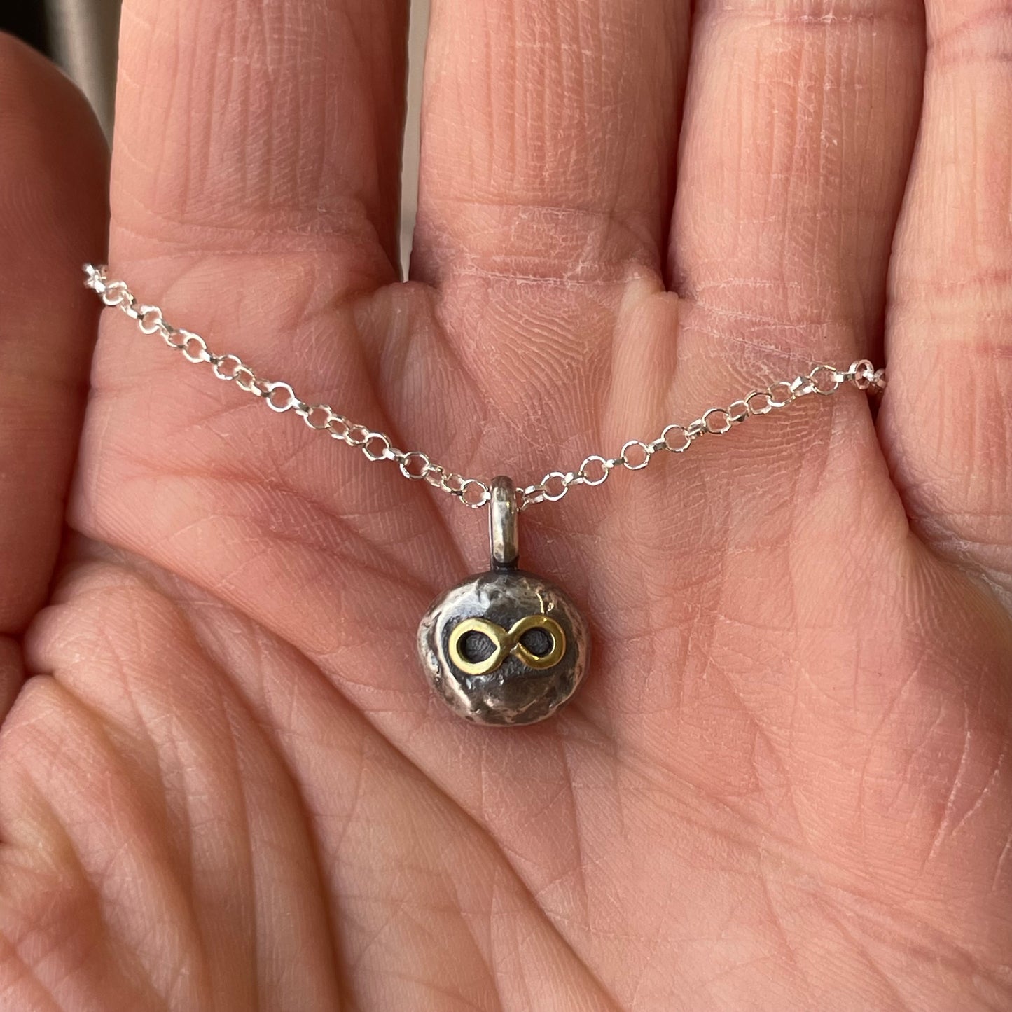 Sterling free form pendant with Infinity symbol