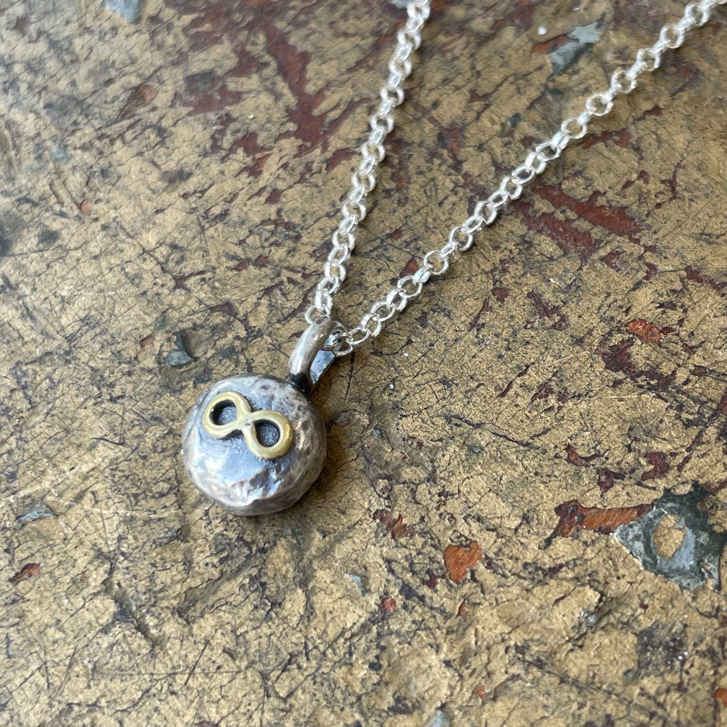 Sterling free form pendant with Infinity symbol