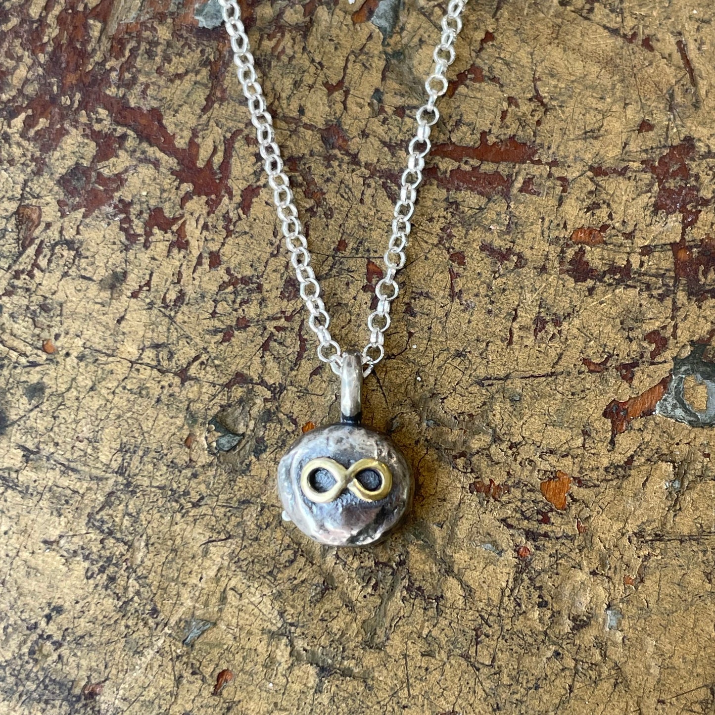 Sterling free form pendant with Infinity symbol
