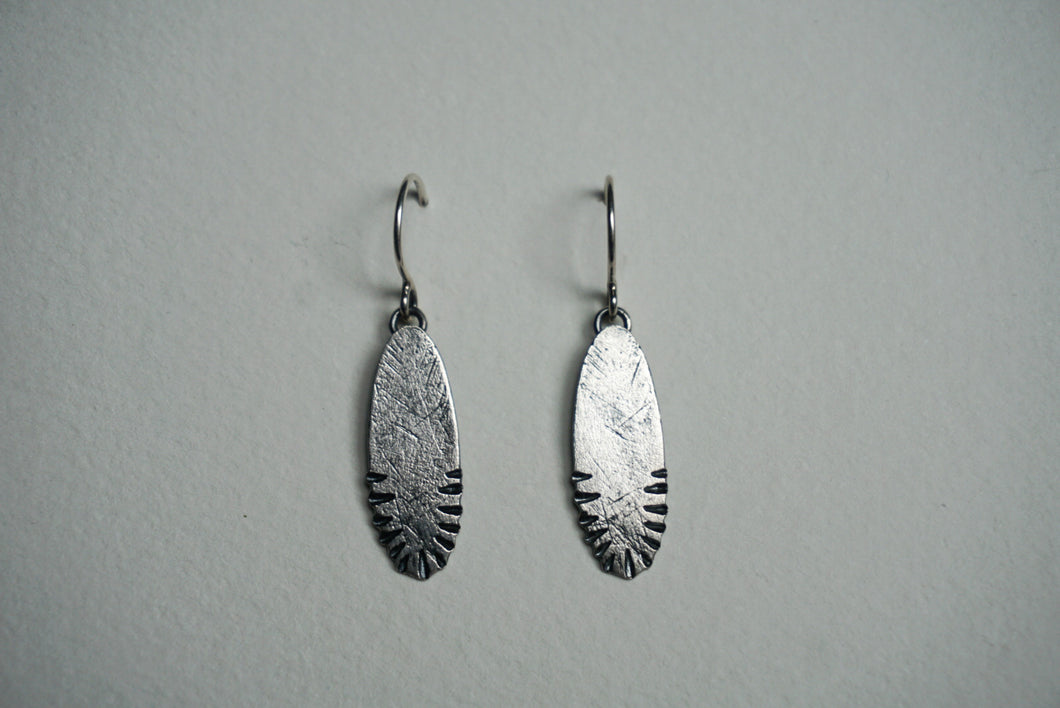 Medium oval sterling silver ridge textured earring