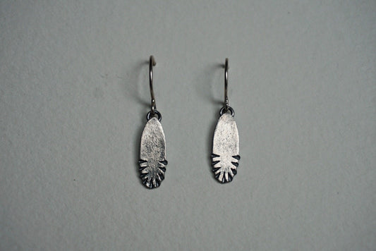 Small oval sterling silver ridge textured earring