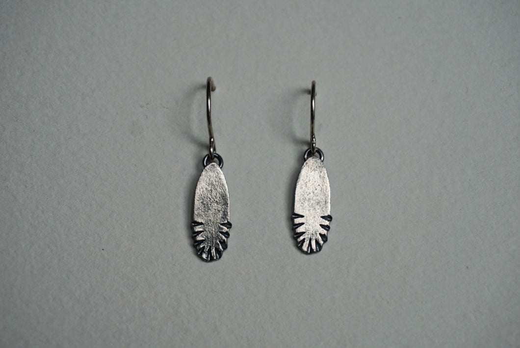 Small oval sterling silver ridge textured earring