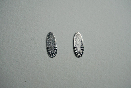 Small oval sterling silver ridge textured stud earring