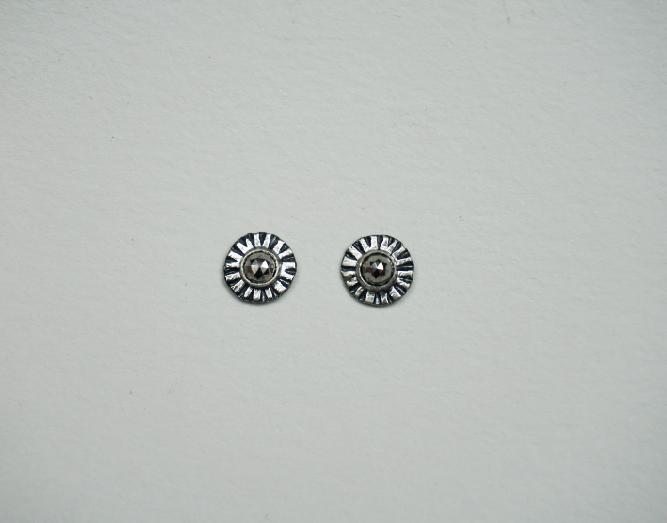 Small sterling silver ridge circle post stud earring with faceted pyrite