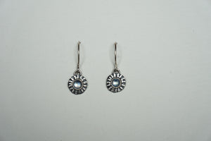 Small silver ridged circle drop earring with moonstone
