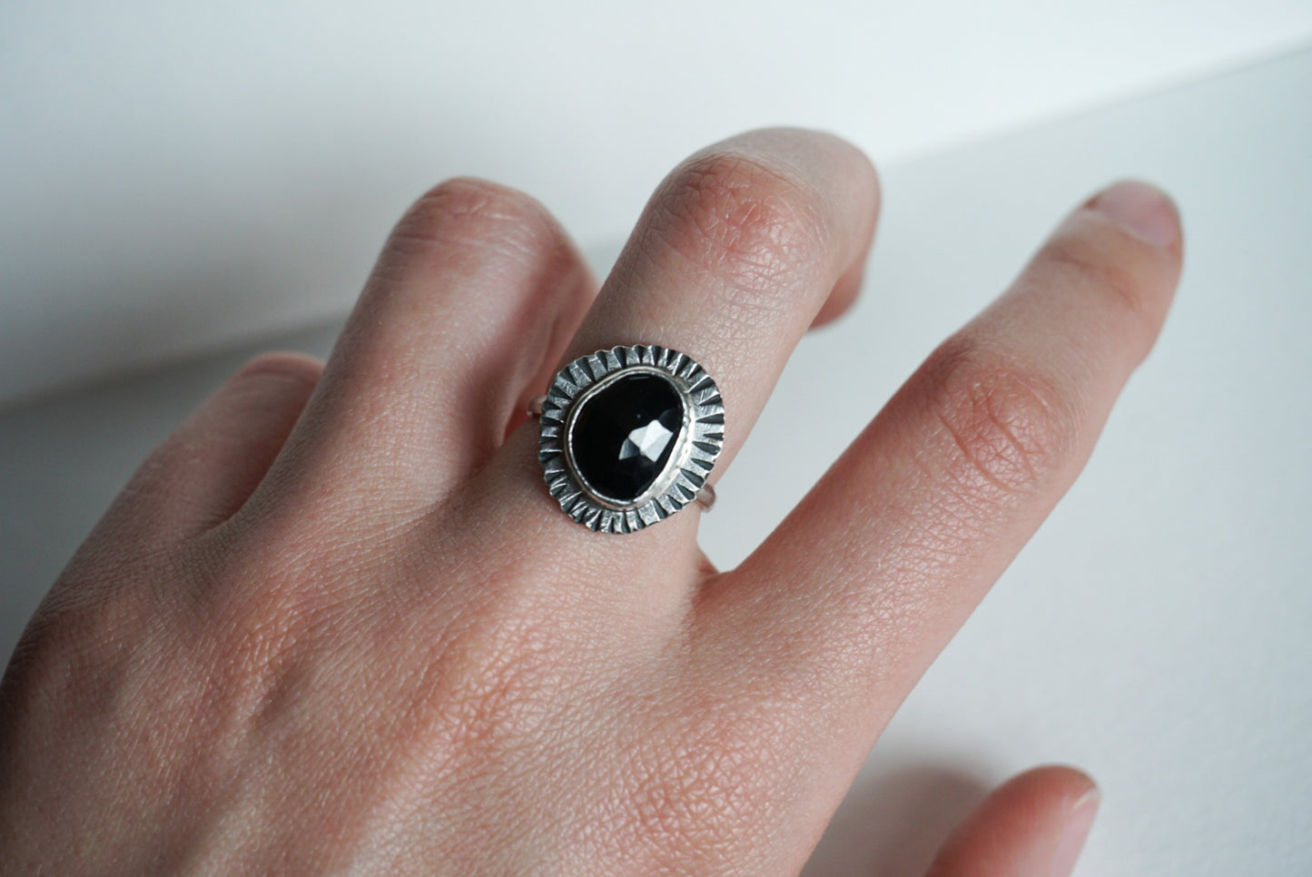 Faceted black spinel and silver ring size 7.5