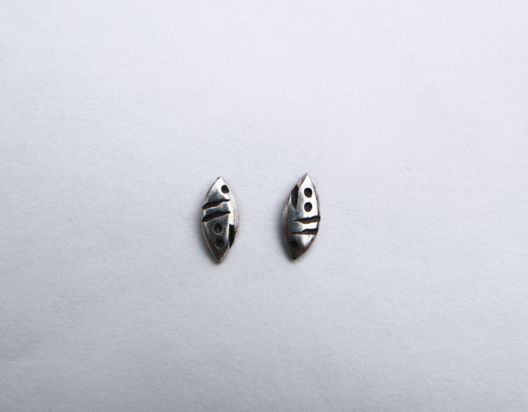 Large patterned ellipse silver studs