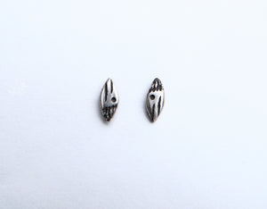 Small patterned ellipse silver studs