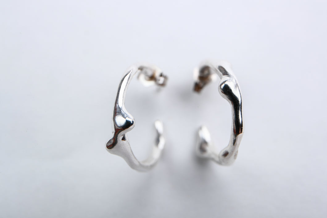Organically shaped silver hoop earrings