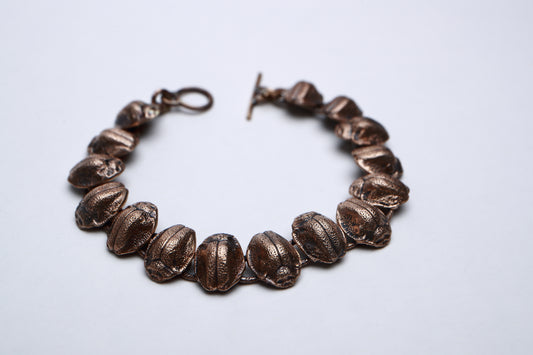 Bronze beetle link bracelet