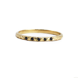 14K Gold band with black diamonds