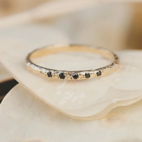 14K Gold band with black diamonds