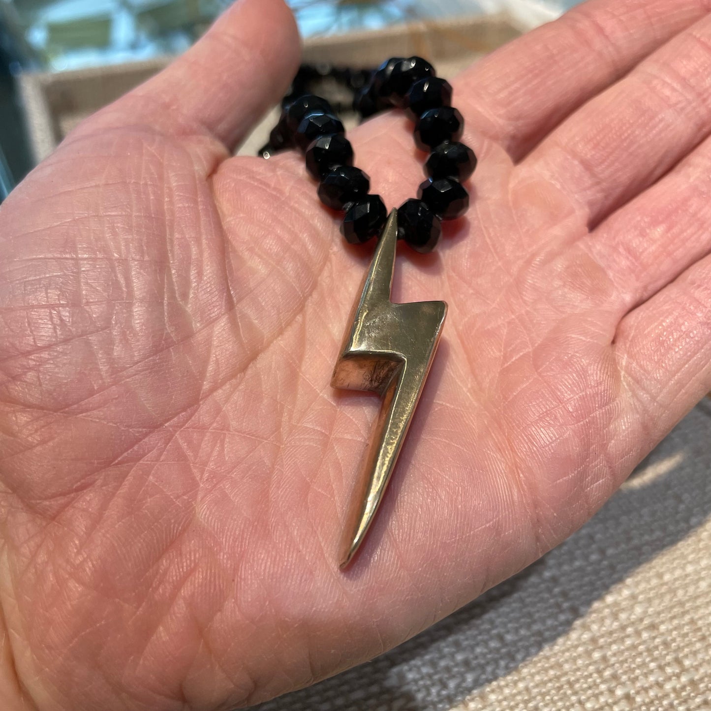 Bronze Lightening Bolt on Jet Beads