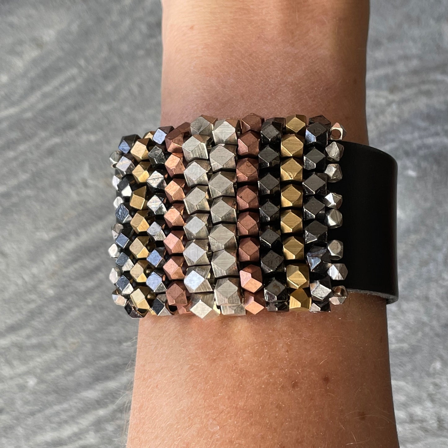Faceted multi-Metal Beads on Black Leather