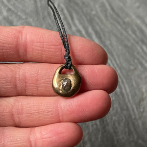 Bronze “locket” with Montana Sapphire