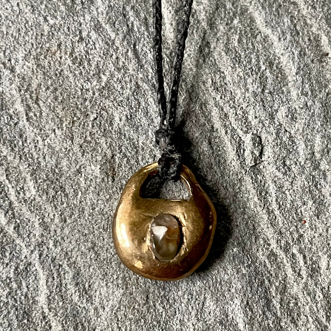Bronze “locket” with Montana Sapphire